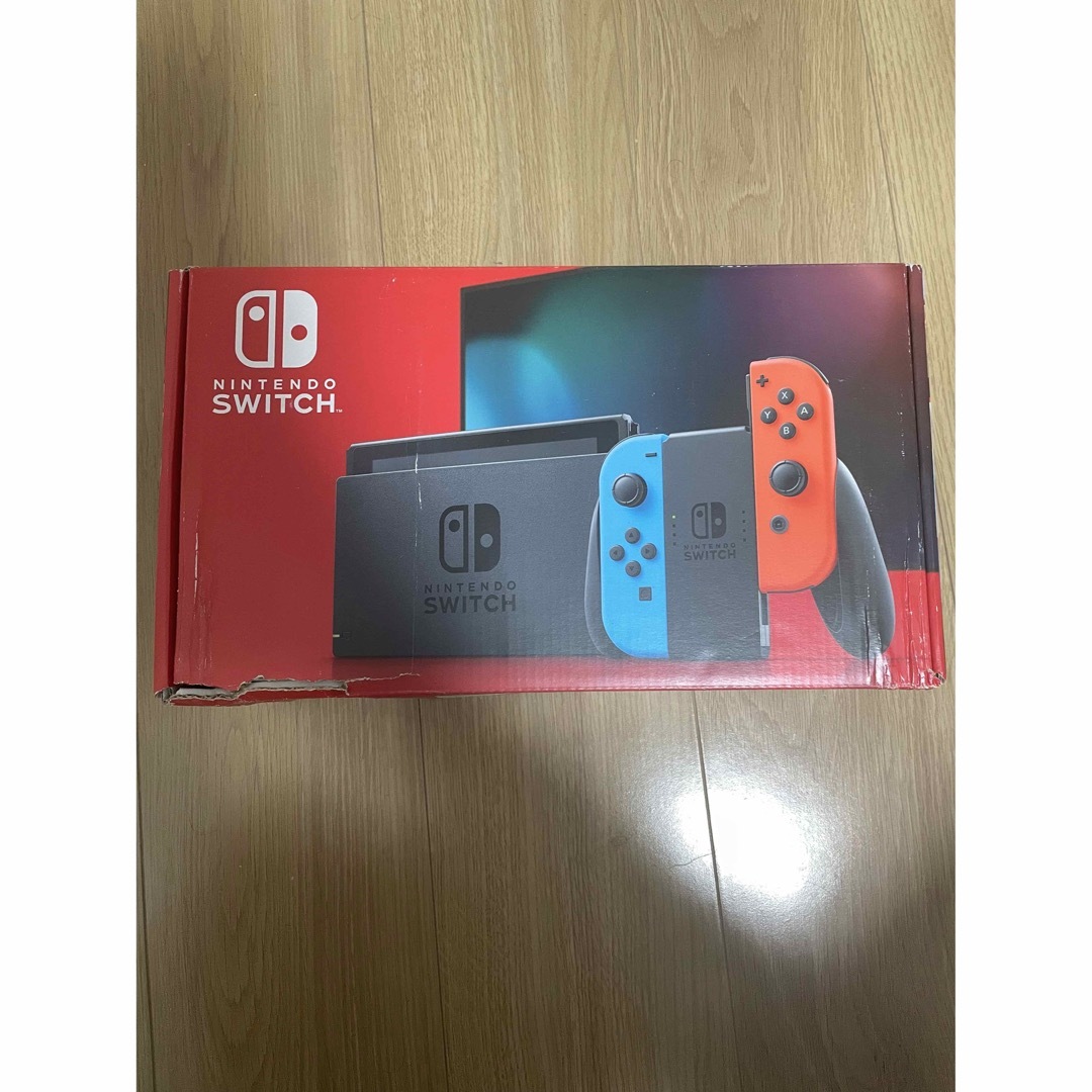 Nintendo Switch(ニンテンドースイッチ)の【中古】Nintendo Switch ネオンレッド&ブルー エンタメ/ホビーのゲームソフト/ゲーム機本体(家庭用ゲーム機本体)の商品写真