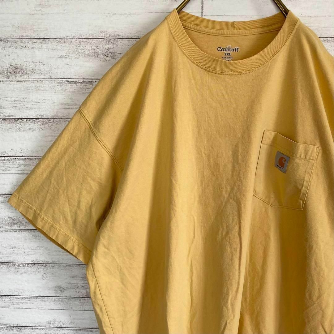 carhartt(カーハート)のカーハート　Tシャツ　半袖　胸ポケット　ワンポイント　イエロー　古着　2XL メンズのトップス(Tシャツ/カットソー(半袖/袖なし))の商品写真