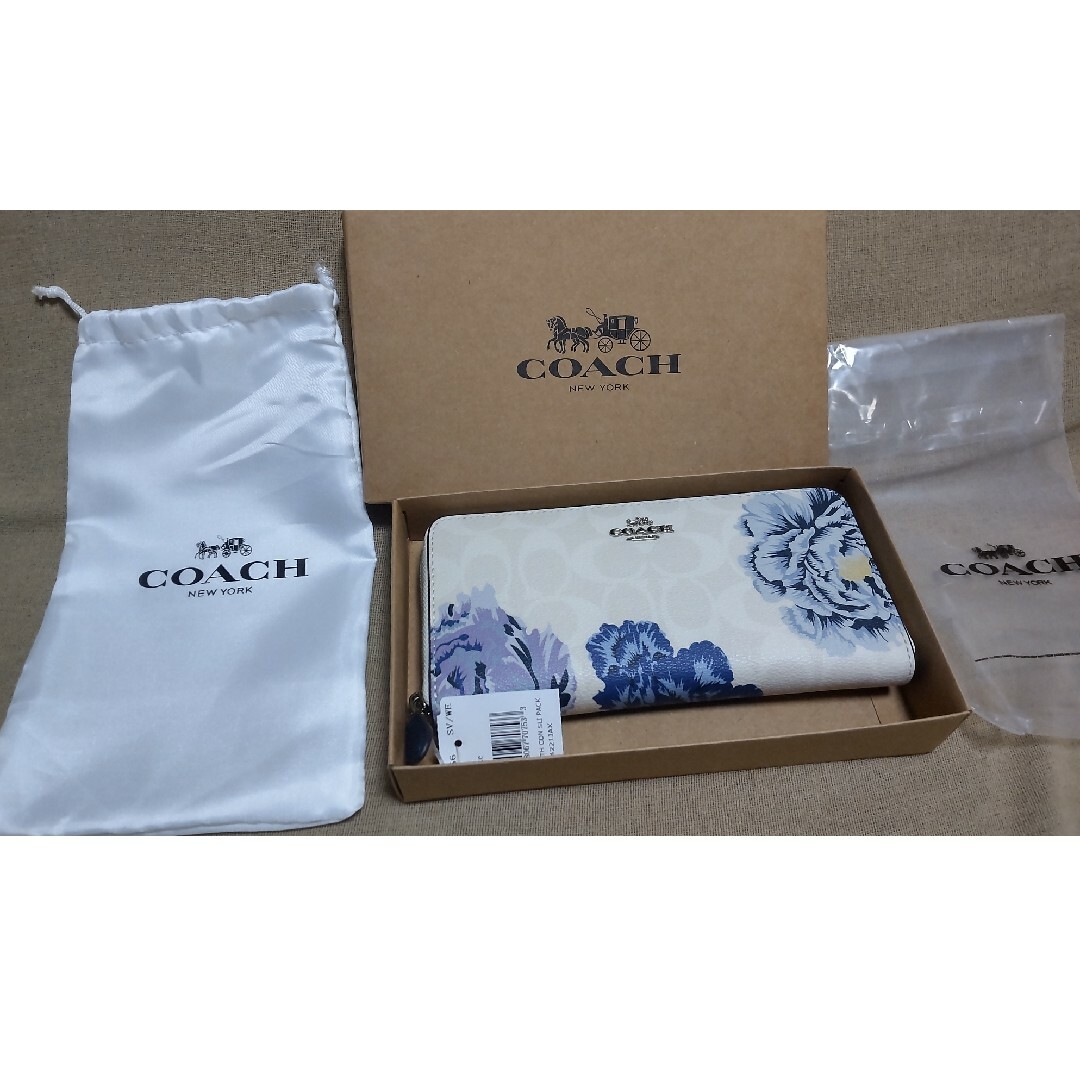 COACH(コーチ)の【新品・未使用】COACH 長財布 シグネチャーパープル花柄 レディースのファッション小物(財布)の商品写真