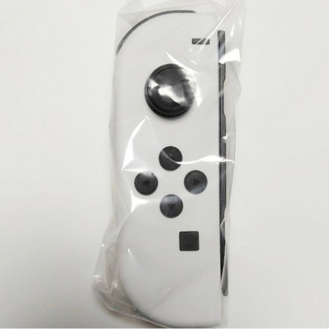 Nintendo Switch(ニンテンドースイッチ)の【ほぼ新品】Joy-Con　左　有機モデル ホワイト　ニンテンドースイッチ エンタメ/ホビーのゲームソフト/ゲーム機本体(家庭用ゲーム機本体)の商品写真