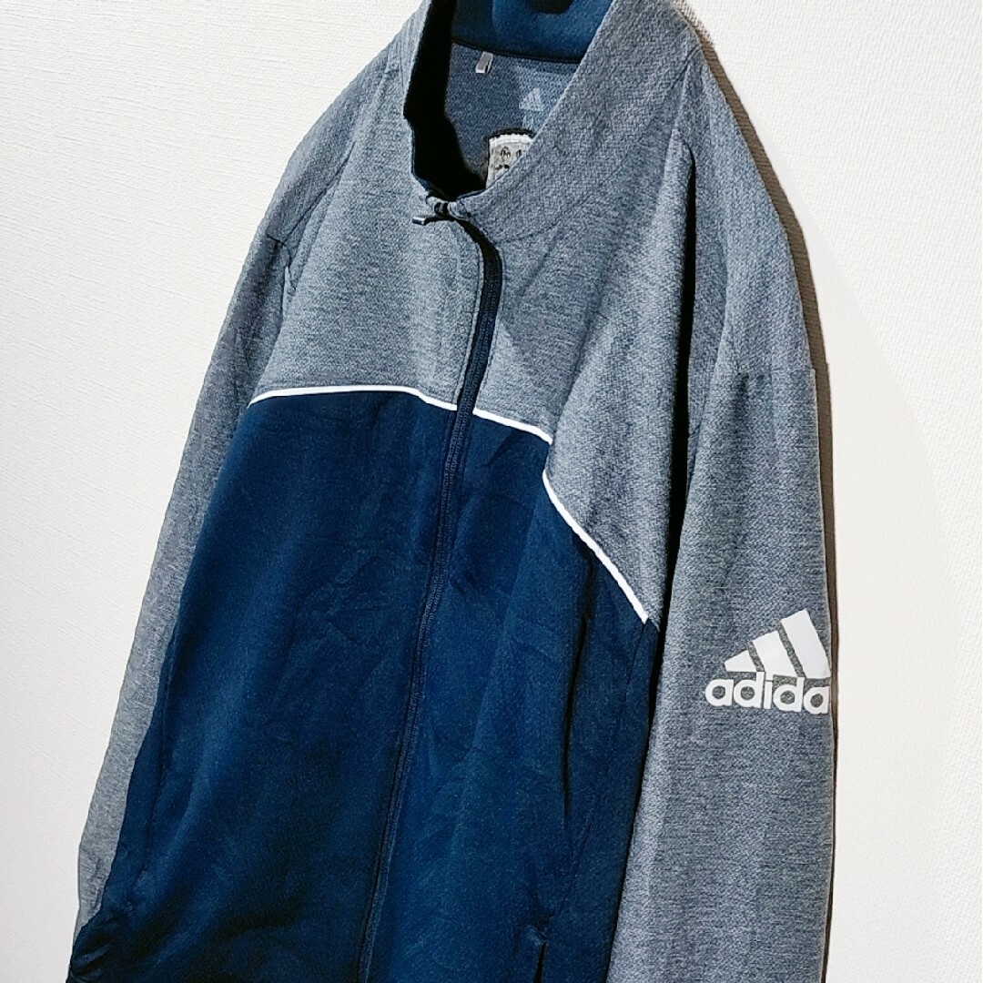 adidas(アディダス)のアディダス　ジップアップ　トラックジャケット　Mサイズ　グレー　ネイビー メンズのトップス(ジャージ)の商品写真