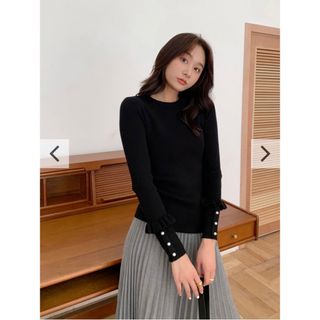 ザラ(ZARA)のバースデーバッシュ　ポイントパールトップス　ブラック　フリル　ニット　新品(ニット/セーター)