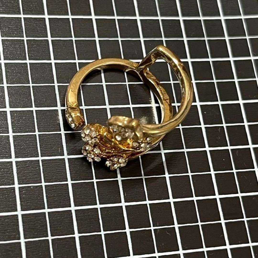 指輪　レディース　ゴールド　調節　フラワー　螺旋　リーフ　お花　上品　キュー レディースのアクセサリー(リング(指輪))の商品写真