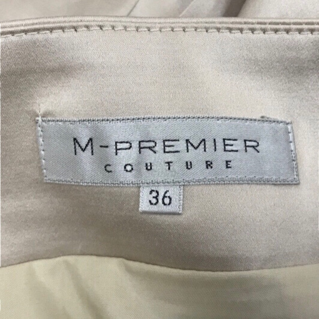 M-premier(エムプルミエ)の【新品タグ付き】M-PREMIER フレアスカート  ベージュ　膝丈　36 S レディースのスカート(ひざ丈スカート)の商品写真