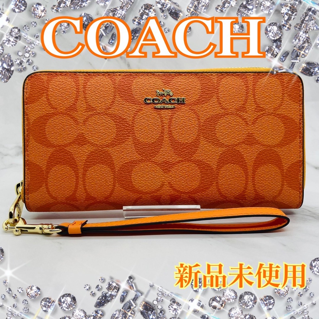 COACH(コーチ)のCOACH 長財布 オレンジ シグネチャー  ストラップ付 レディースのファッション小物(財布)の商品写真