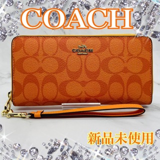 コーチ(COACH)のCOACH 長財布 オレンジ シグネチャー  ストラップ付(財布)