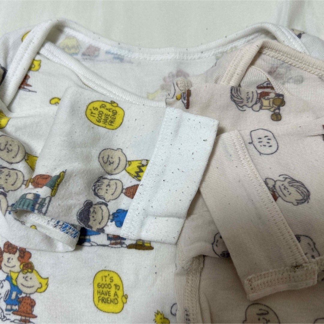 UNIQLO(ユニクロ)の【UNIQLO Baby】スヌーピー柄長袖ロンパース キッズ/ベビー/マタニティのベビー服(~85cm)(ロンパース)の商品写真