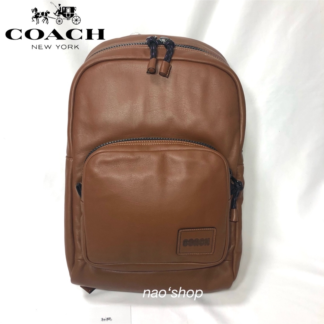 ブランドバッグ通勤通学黒【新品】COACH コーチ リュック バックパック パッチ サドル