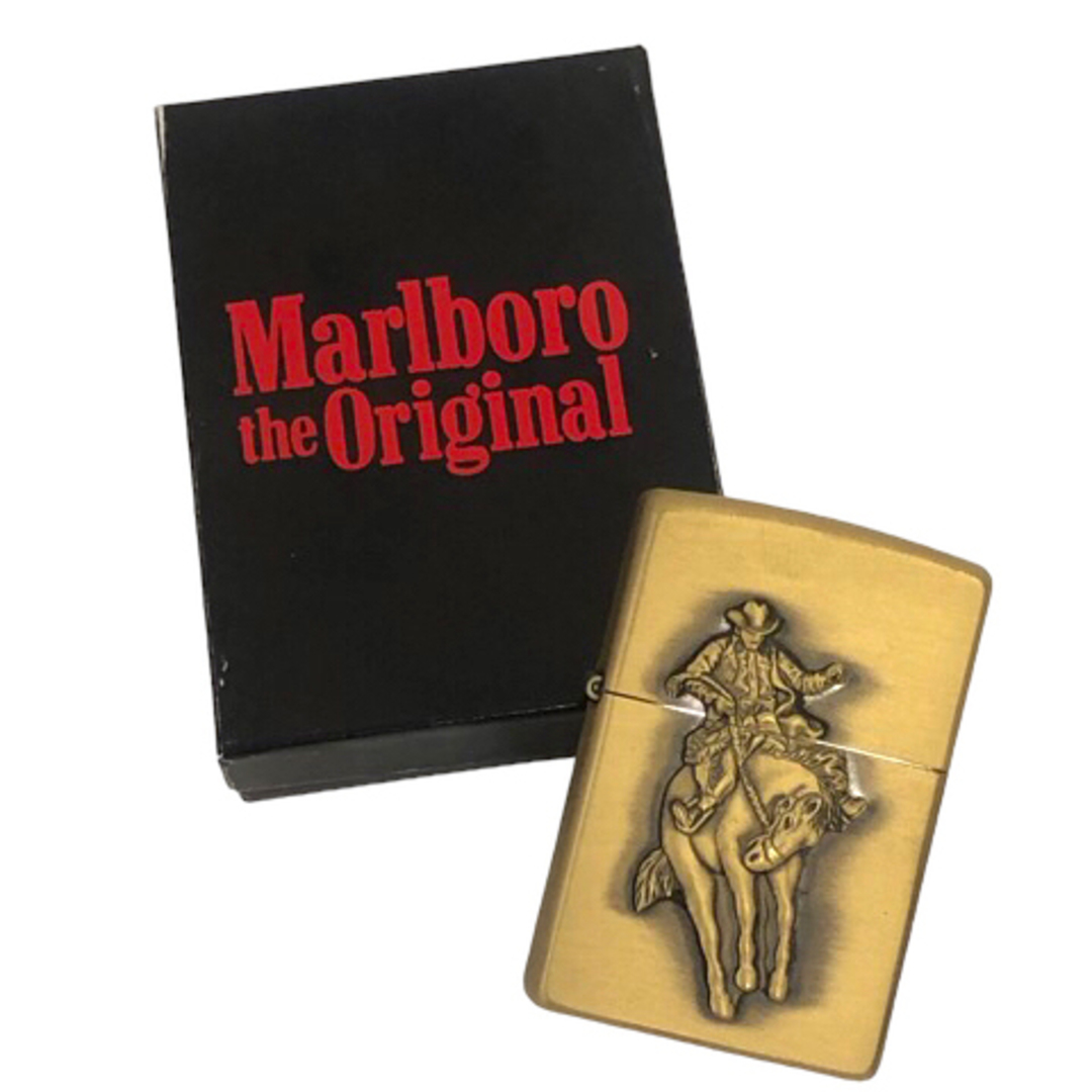 ZIPPO(ジッポー)のジッポー 1999年製 マルボロ カウボーイ ロデオ オイルライター 金 ※TP メンズのファッション小物(その他)の商品写真