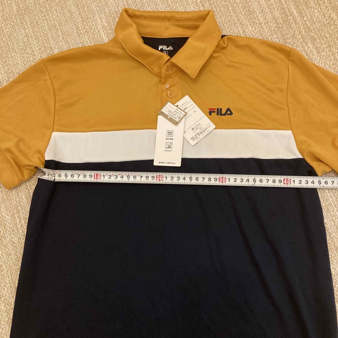 FILA(フィラ)のFILA タグ付き　ポロシャツ　最終値下げ メンズのトップス(ポロシャツ)の商品写真