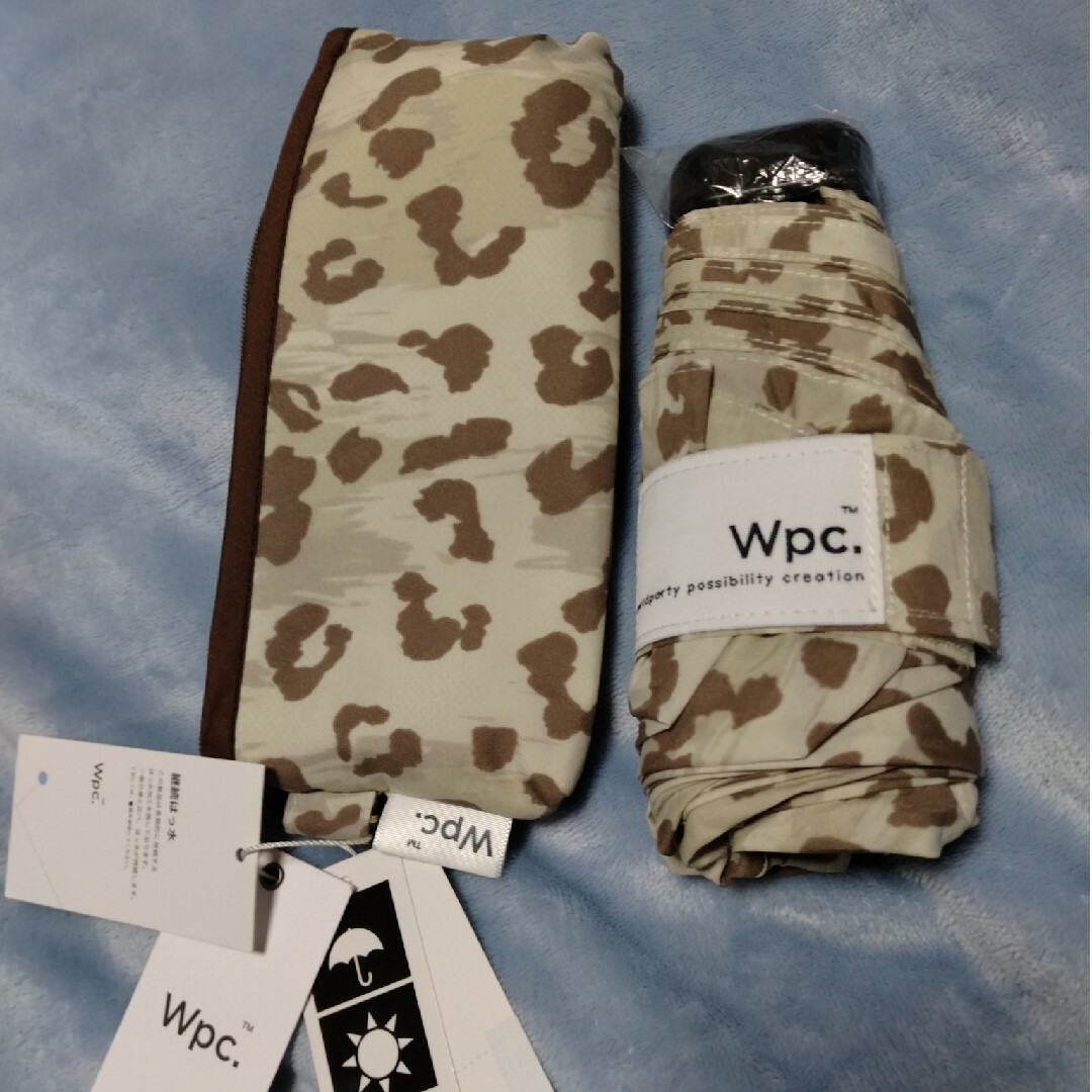 Wpc.(ダブルピーシー)のWpc 折りたたみ傘 ブラッシュレオパードmini ヒョウ柄 コンパクトサイズ レディースのファッション小物(傘)の商品写真