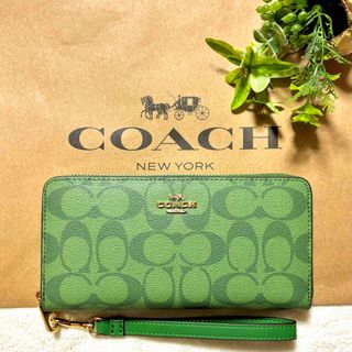 【新品未使用】COACH ラウンドジップ ストラップ　馬車　グリーン