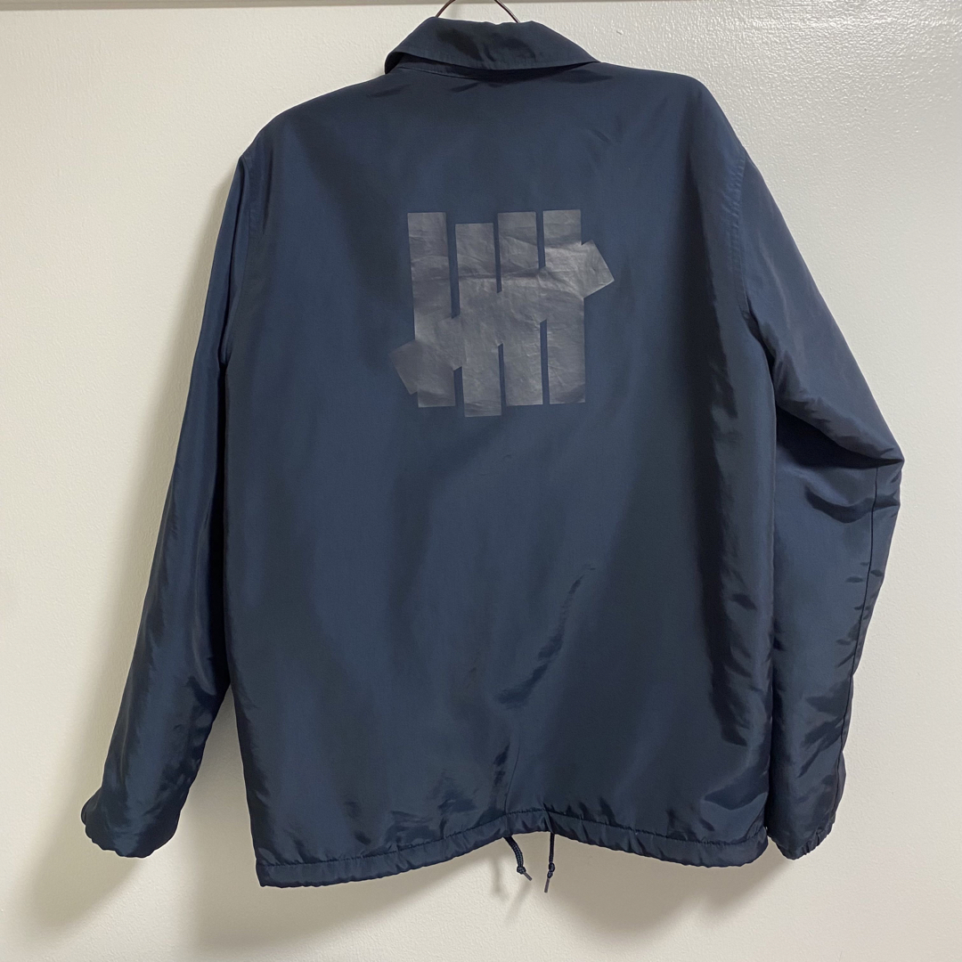 UNDEFEATED(アンディフィーテッド)のChampion×UNDEFEATED 裏ボアコーチジャケット　コラボ商品 メンズのジャケット/アウター(ナイロンジャケット)の商品写真