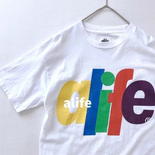 エーライフ(ALIFE)のAlife　エーライフ　カラフルなビッグロゴ半袖Tシャツ　ホワイト　Mサイズ(Tシャツ/カットソー(半袖/袖なし))