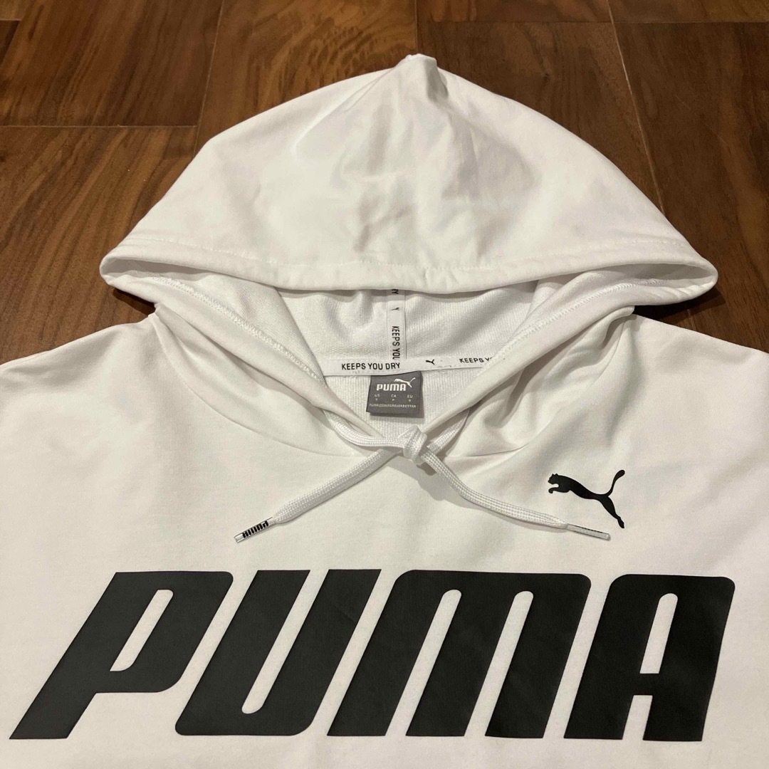 PUMA(プーマ)のPUMA  ショート丈 パーカー  Ｓ ホワイト レディースのトップス(トレーナー/スウェット)の商品写真