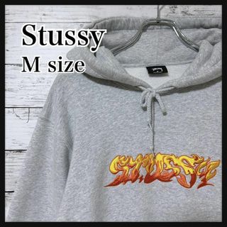 ステューシー(STUSSY)の【即完売モデル】ステューシー ファイヤー刺繍ロゴ パーカー 入手困難 M(パーカー)