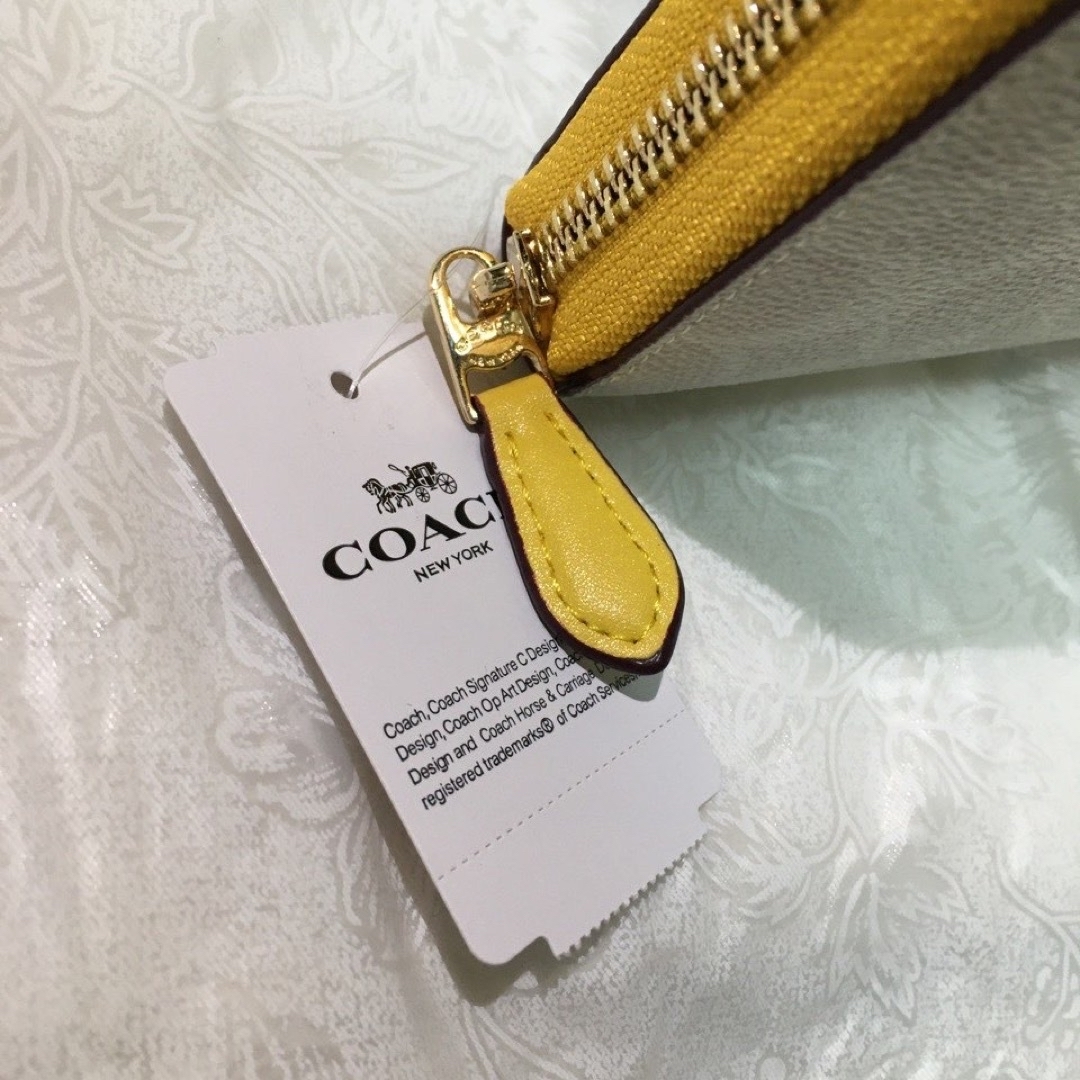 COACH(コーチ)の贈り物にも☆コーチ 金運 おしゃれイエローエッジ 長財布 レディースのファッション小物(財布)の商品写真