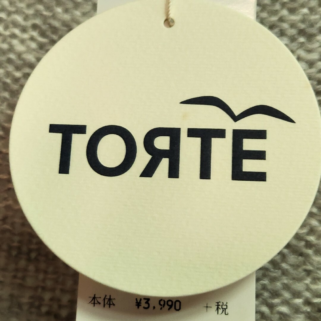 TORTE(トルテ)のTORTE 未使用タグ付きライトグレーニット レディースのトップス(ニット/セーター)の商品写真