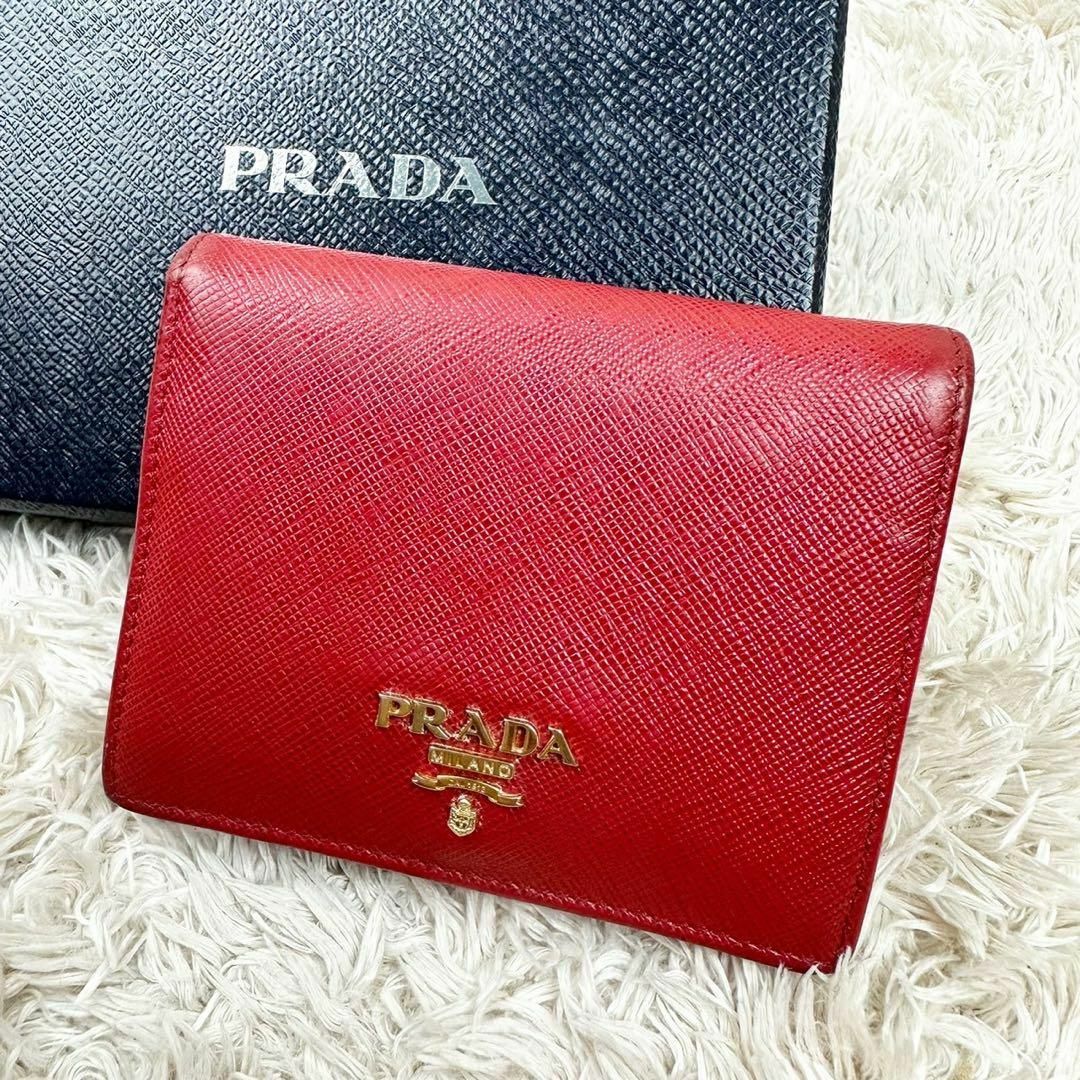 【美品】プラダ 二つ折り財布 レッド ゴールドロゴ サフィアーノ レディースのサムネイル