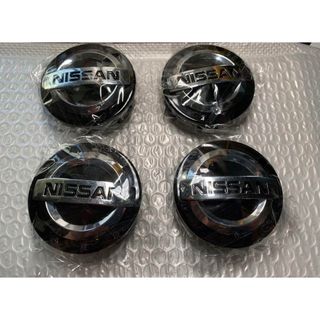 ニッサン(日産)の新品未使用 日産ホイールセンターキャップ 直径60MM 4枚セット(車外アクセサリ)