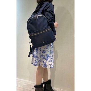 トッカ(TOCCA)のトッカ　tocca ＳＩＤＥ　ＲＩＢＢＯＮＢＡＣＫＰＡＣＫリュックサックネイビー(リュック/バックパック)