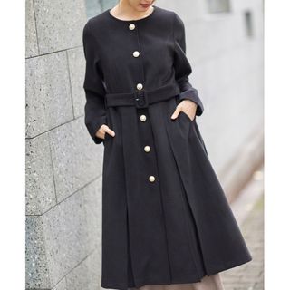 トッコクローゼット(TOCCO closet)の新品 tocco closet 付きパール釦ノーカラータックフレアコート(ロングコート)