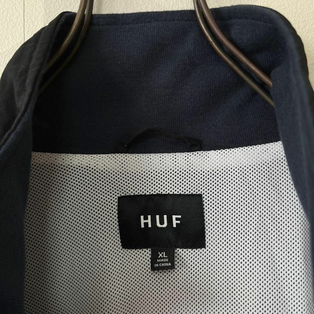 ジャケット/アウター【HUF】状態◯ サイズL 切り替え 刺繍ロゴ ナイロンジャケット 黒青 ハフ