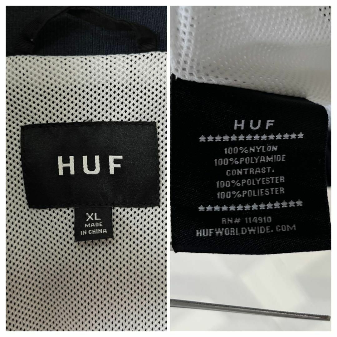 HUF(ハフ)の【HUF】状態◯ サイズL 切り替え 刺繍ロゴ ナイロンジャケット 黒青 ハフ メンズのジャケット/アウター(ナイロンジャケット)の商品写真