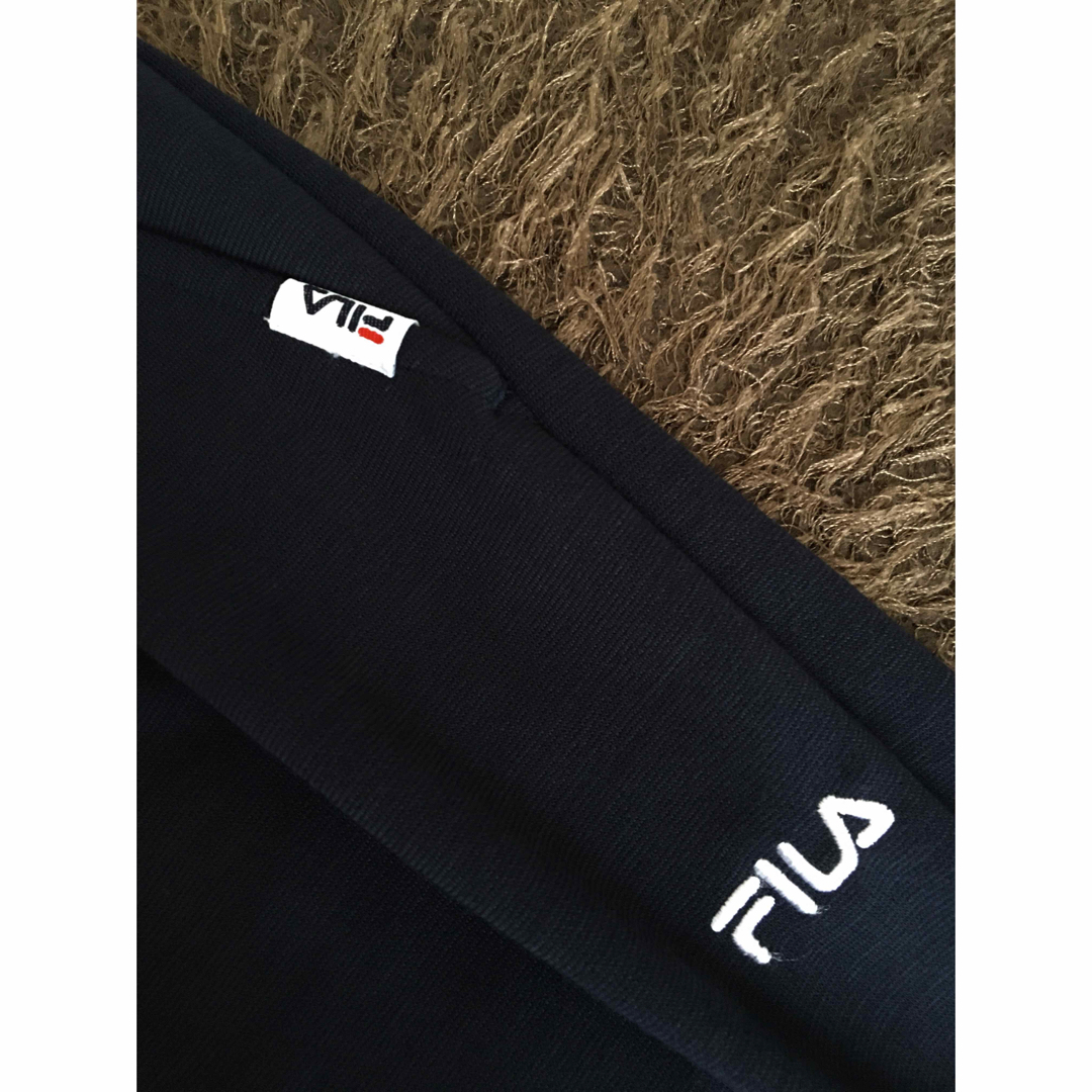 FILA(フィラ)の新品 FILA レイヤードトップス+タックテーパードパンツ セットアップ 2点 レディースのトップス(その他)の商品写真