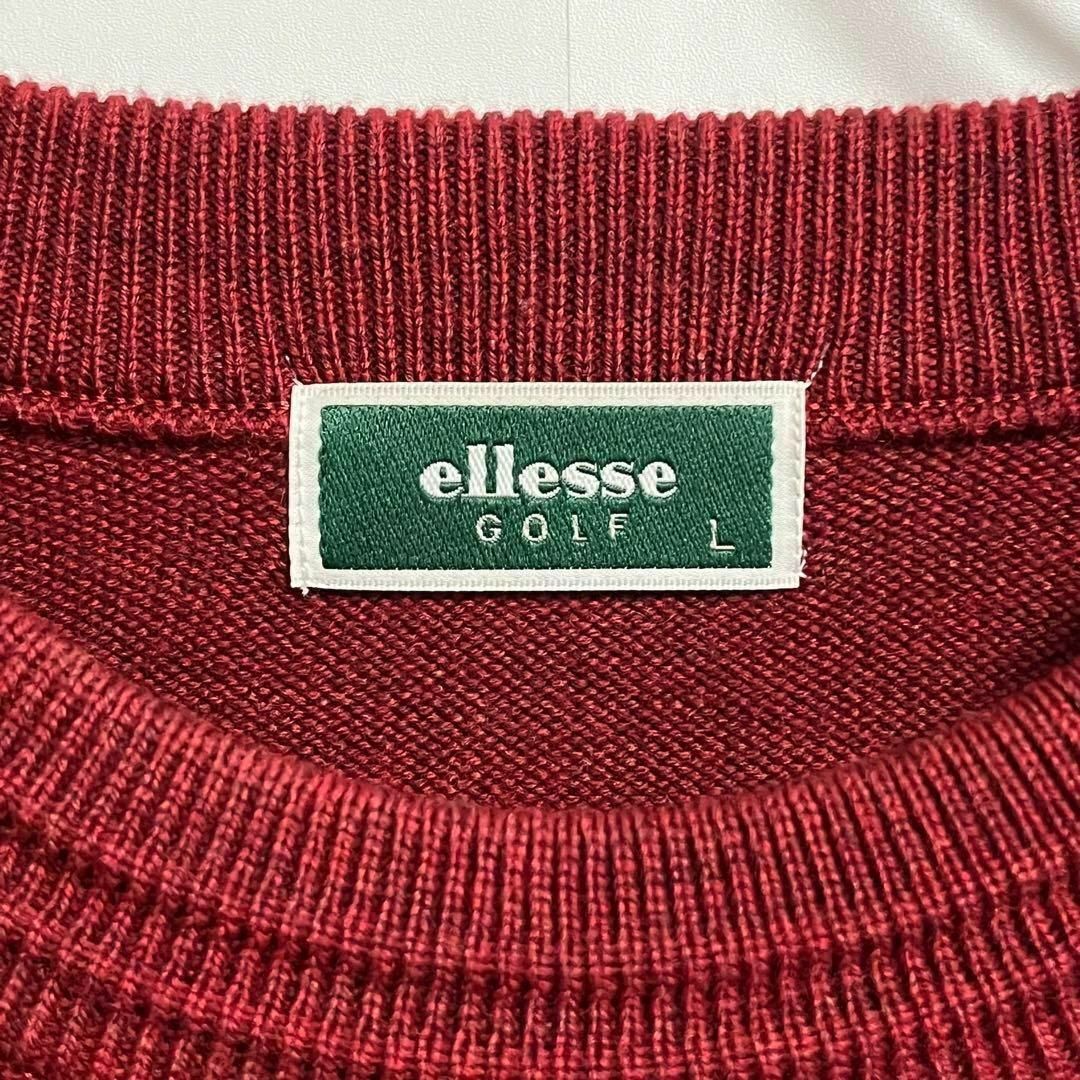 ellesse(エレッセ)のエレッセ　ゴルフウェア　ニット　刺繍　アップリケ　ワインカラー　えんじ色 スポーツ/アウトドアのゴルフ(ウエア)の商品写真