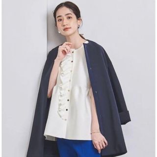 ユナイテッドアローズ(UNITED ARROWS)のユナイテッドアローズ　新品タグ付フリルニットベスト　ホワイト　白(ベスト/ジレ)