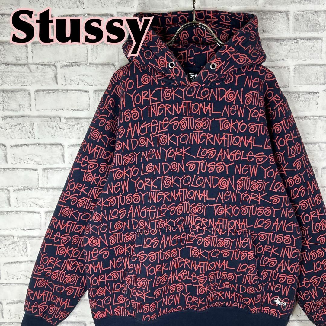 STUSSY - stussy ステューシー パーカー ワールドツアー 総柄 ワン