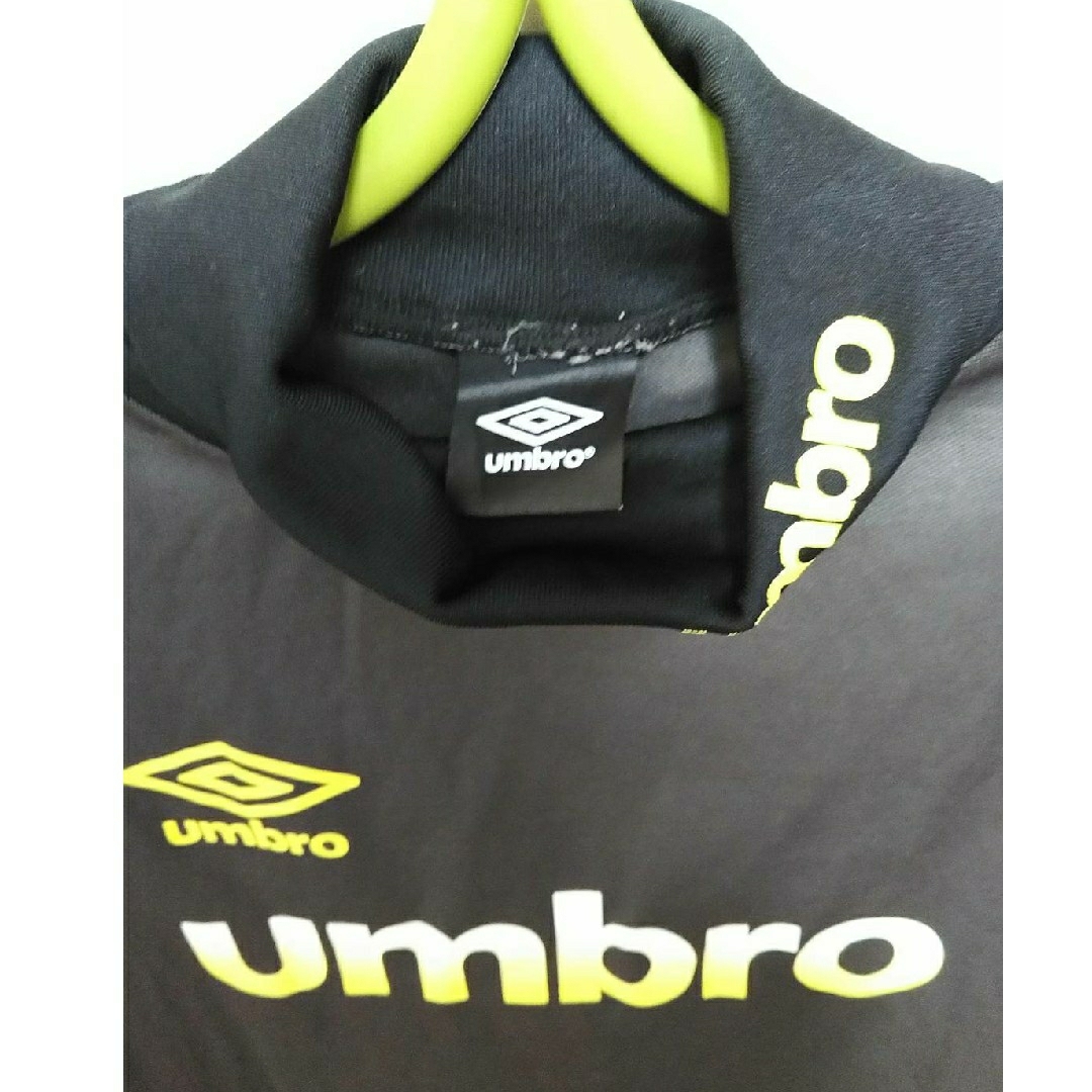 UMBRO(アンブロ)の〓UMBLO〓タートルウェア140cm  ココア×黒×黄  インナーシャツ 男女 キッズ/ベビー/マタニティのキッズ服男の子用(90cm~)(Tシャツ/カットソー)の商品写真