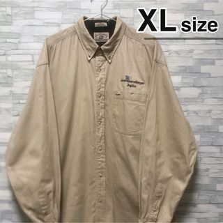 シャツ(shirts)のワークシャツ　長袖　べージュ　ライトブラウン　企業ロゴ　ボタンダウン　USA古着(シャツ)