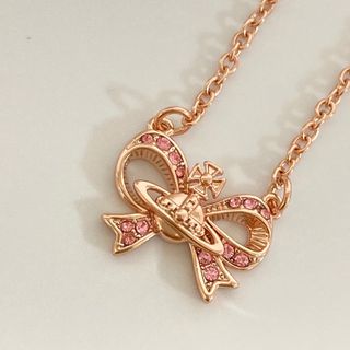 ヴィヴィアンウエストウッド(Vivienne Westwood)のヴィヴィアン　リボンオーブネックレス　ピンクゴールド(ネックレス)