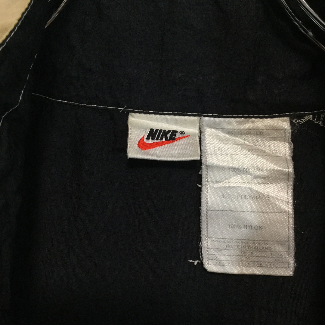 NIKE(ナイキ)の【ナイキ ナイロンジャケット】 90s 銀タグ 背面ビッグロゴ 2XL 黒 古着 メンズのジャケット/アウター(ナイロンジャケット)の商品写真