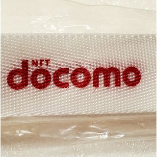 エヌティティドコモ(NTTdocomo)の【新品】NTTdocomo　ネックストラップ  ホワイト 　レッド文字 非売品(ノベルティグッズ)