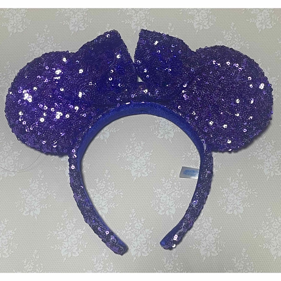 Disney(ディズニー)の【ごまちゃん様専用】ディズニーカチューシャ スパンコール 紫 レディースのヘアアクセサリー(カチューシャ)の商品写真