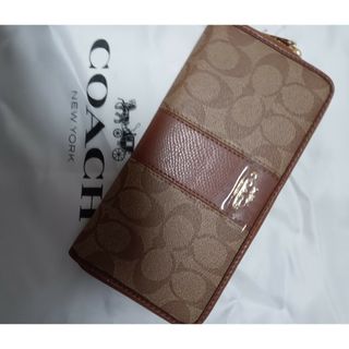 コーチ(COACH)のCOACHアウトレット長財布シグネチャーベージュ(財布)