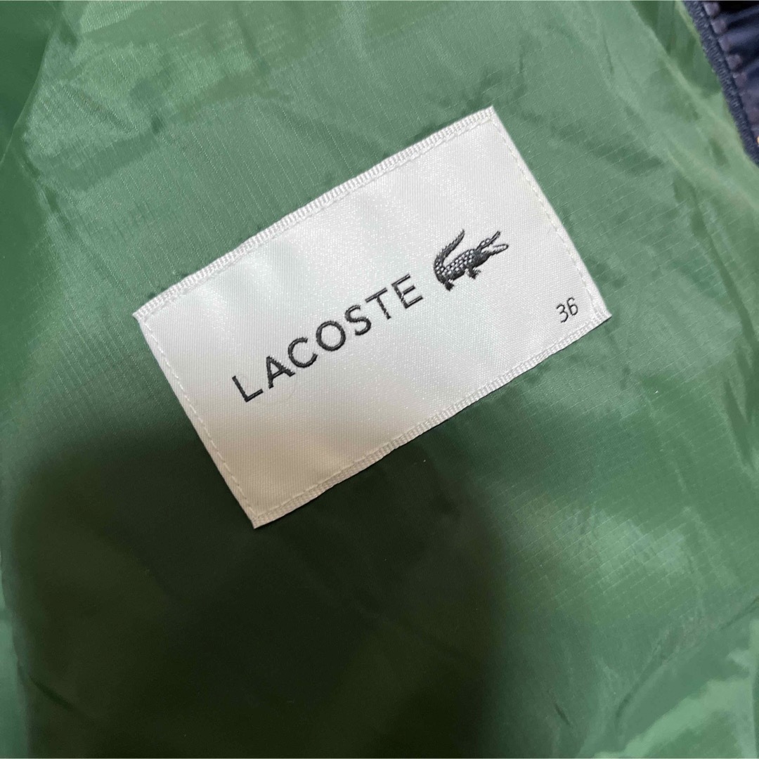 LACOSTE(ラコステ)のラコステ 収納フード付きカラーブロックダウンジャケット （ネイビー） レディースのジャケット/アウター(ダウンジャケット)の商品写真