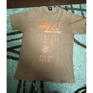 ステューシー Tシャツ・カットソー(メンズ)（オレンジ/橙色系）の通販