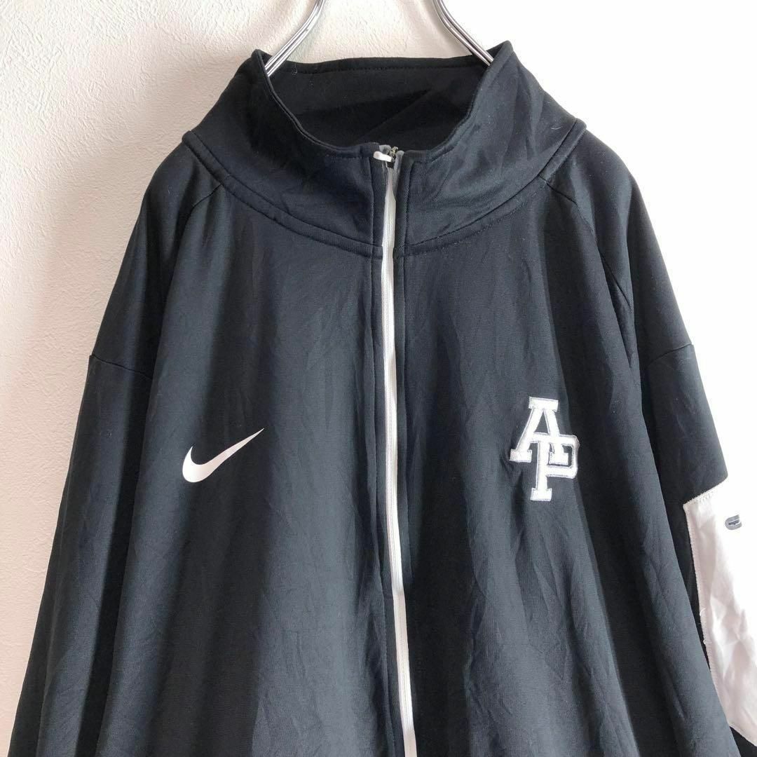 NIKE(ナイキ)のNIKE ナイキ　トラックジャケット　L ワンポイントロゴ　古着　ジャージ　黒 メンズのトップス(ジャージ)の商品写真