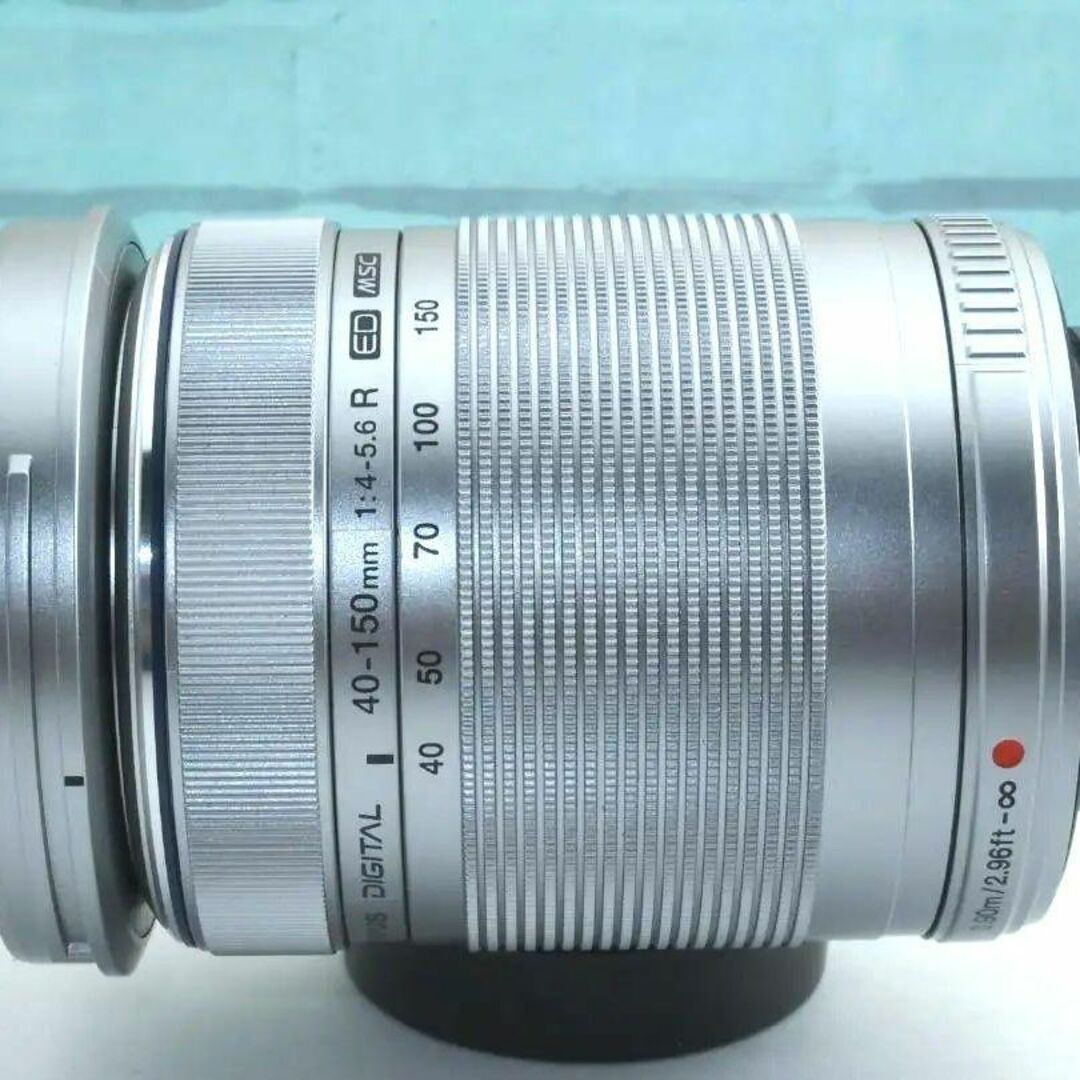 OLYMPUS(オリンパス)のOLYMPUS オリンパス❤️望遠ズームレンズ❤️40-150mm R シルバー スマホ/家電/カメラのカメラ(レンズ(ズーム))の商品写真