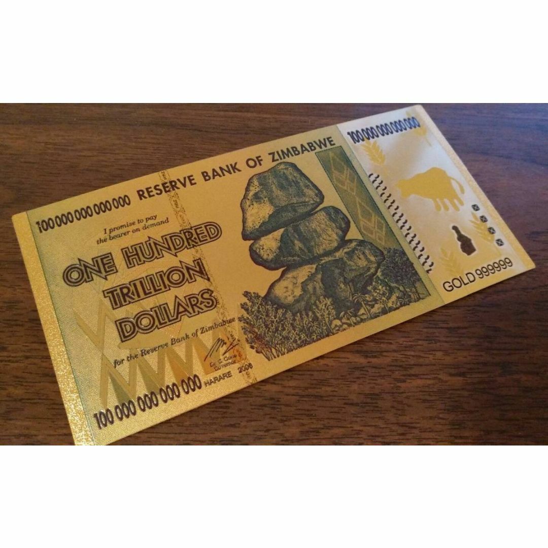 【大人気】ジンバブエドル(100兆ドル) 24k ゴールド ハイパーインフレ紙幣 エンタメ/ホビーのおもちゃ/ぬいぐるみ(その他)の商品写真