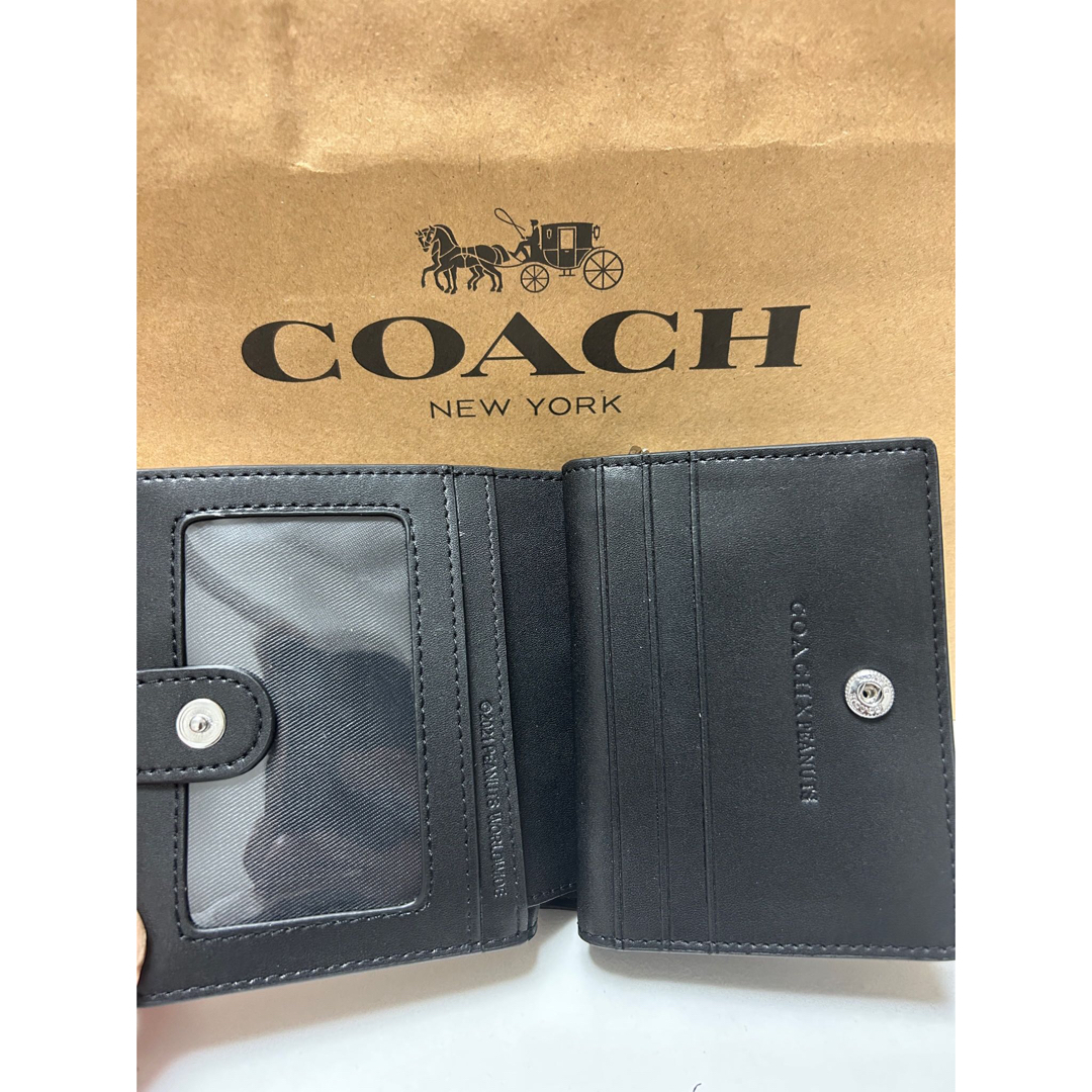 【新品】COACH コーチ ファスナー二つ折り財布 スヌーピー シグネチャー