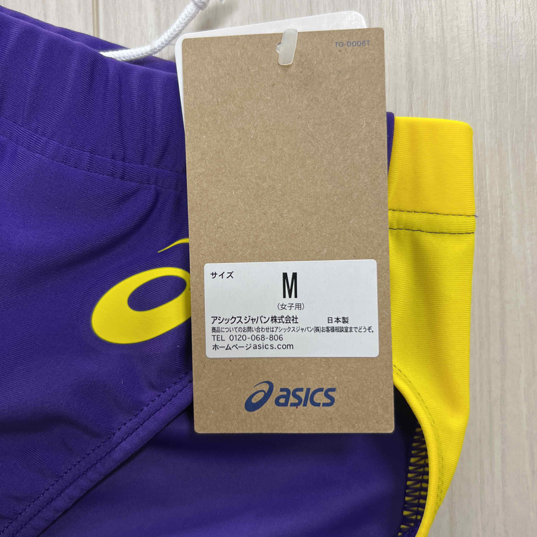 asics(アシックス)のアシックス　女子陸上レーシングショーツ　Mサイズ　パープル×イエロー　新品 スポーツ/アウトドアのスポーツ/アウトドア その他(陸上競技)の商品写真