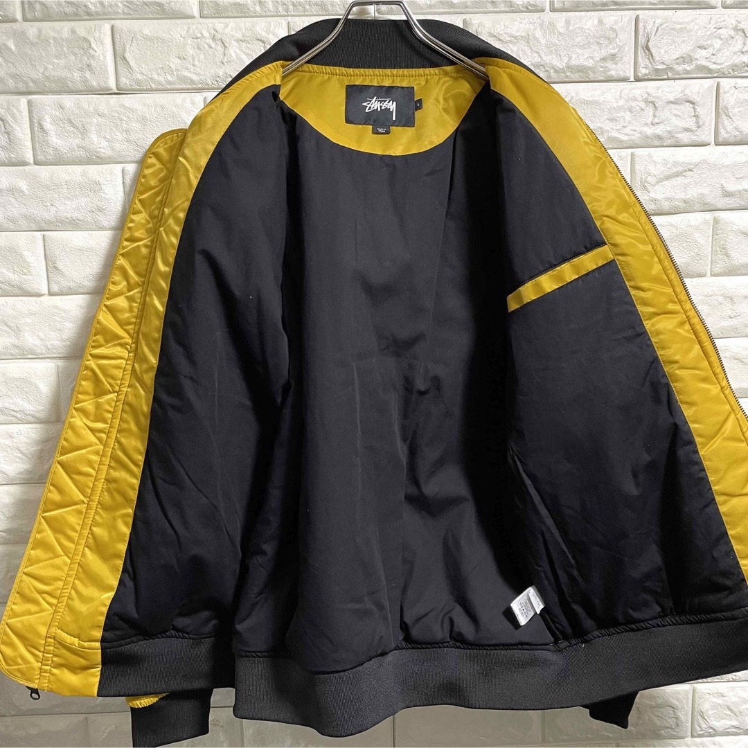 STUSSY(ステューシー)の美品　ステューシー　中綿ナイロンジャケット　MA-1  刺繍ロゴ　メンズLサイズ メンズのジャケット/アウター(ブルゾン)の商品写真