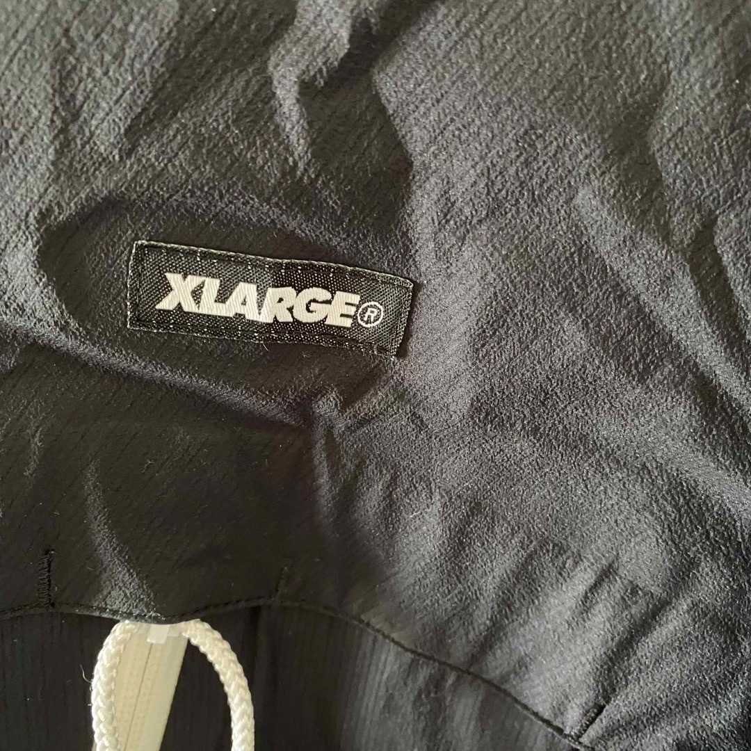 XLARGE(エクストララージ)のXLARGE×Lowe alpineコラボナイロンジャケットマウンテンパーカー黒 メンズのジャケット/アウター(ナイロンジャケット)の商品写真