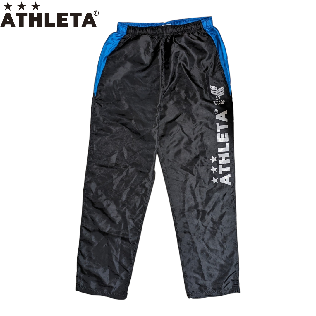 ATHLETA(アスレタ)のATHLETA ブルー サッカー フットサル ウィンドブレーカー パンツ スポーツ/アウトドアのサッカー/フットサル(ウェア)の商品写真