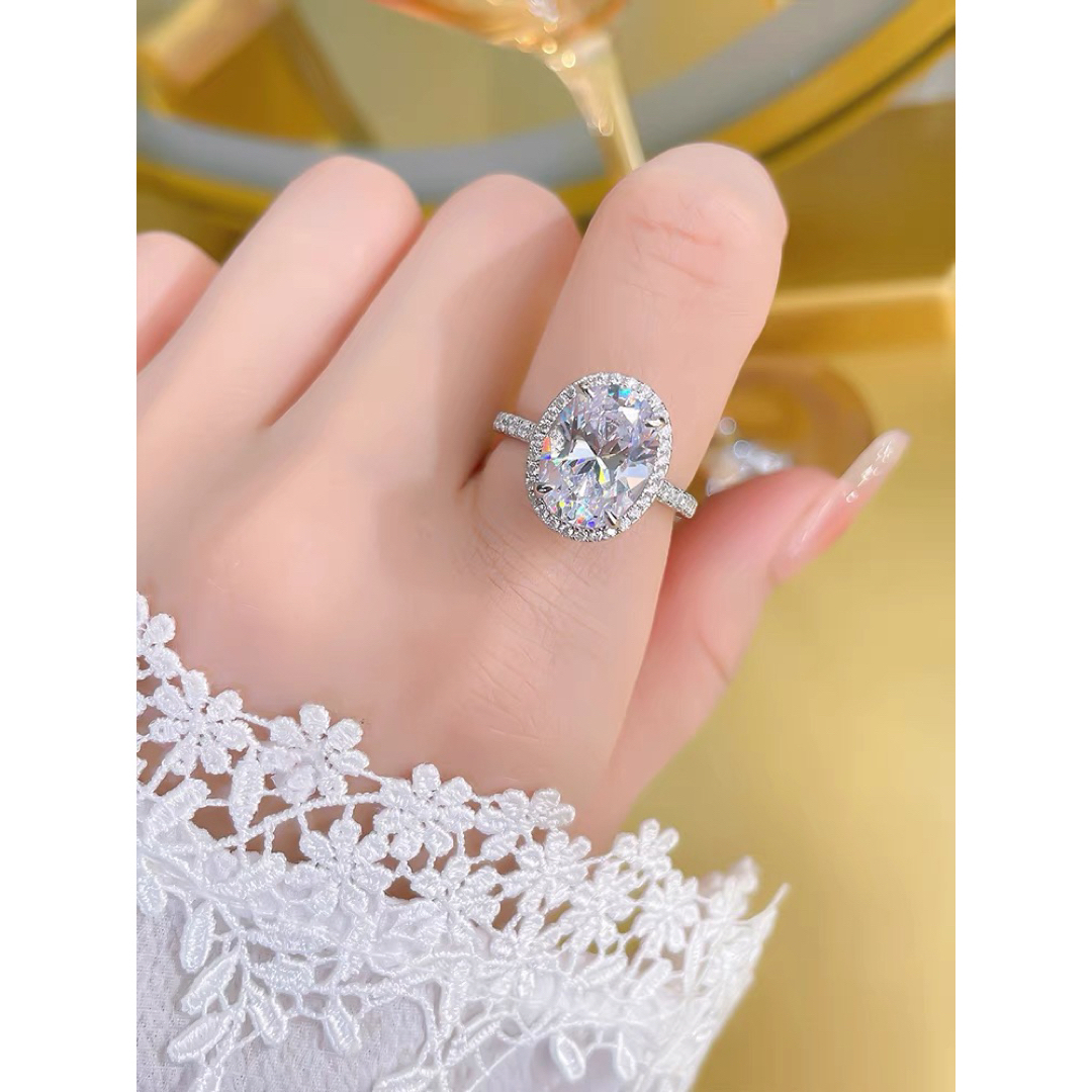 ホワイトゴールドラウンドカット 婚約指輪　リング　人工ダイヤ キラキラ レディースのアクセサリー(リング(指輪))の商品写真